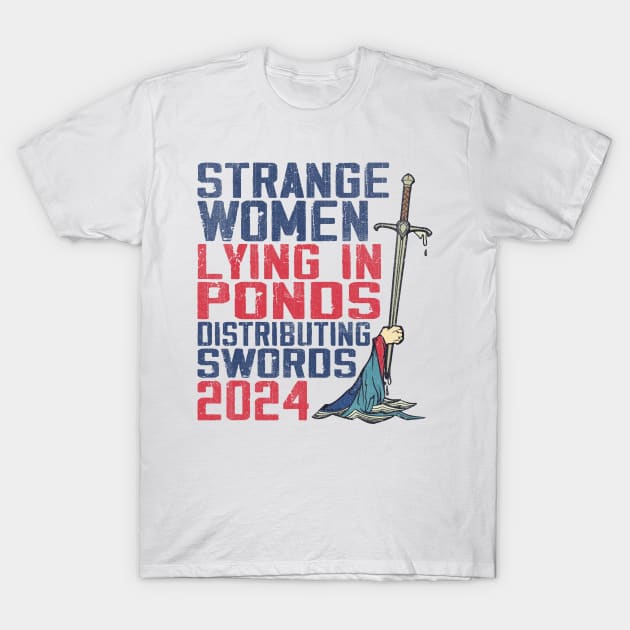 Strange Women Lying In Ponds Distributing Swords T-Shirt by beckeraugustina